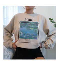 Gildan 18000 **If you are S get M or L for loose-oversized look. If you are L get XL or 2XL. If your size is not in stock please reach out so we can double check for you. **Apparel/design colors may vary across devices. Ideal for any situation, a unisex heavy blend crewneck sweatshirt is pure comfort. These garments are made from polyester and cotton. This combination helps designs come out looking fresh and beautiful. The collar is ribbed knit, so it retains its shape even after washing. There Oversized Graphic Print Aesthetic Sweatshirt, Oversized Aesthetic Sweatshirt With Graphic Print, Monet Paintings Aesthetic, Artsy Sweaters, Diy Hoodie, Paintings Aesthetic, Sweater Art, Art Merch, Frog Shirt