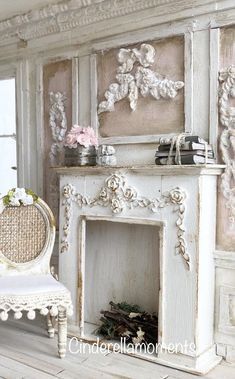 an old white fireplace and chair in a room