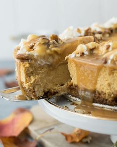 a piece of pumpkin caramel cheesecake on a plate