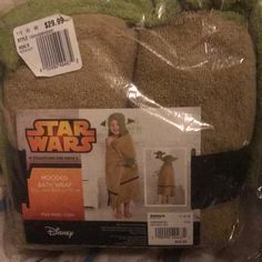 the package is wrapped in plastic and has a star wars character on it's back