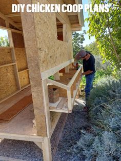 a man is working on building a chicken coop