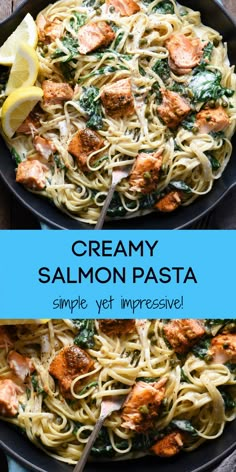 creamy salmon pasta in a skillet with spinach and lemon wedges