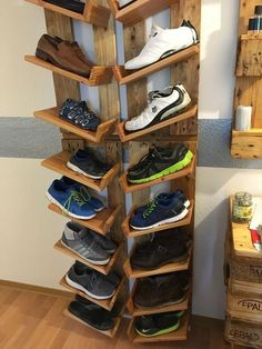 there are many pairs of shoes on the shelf