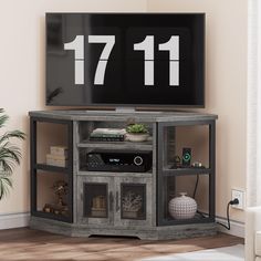 an entertainment center with a flat screen tv