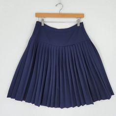 Never Worn Navy Fitted Tennis Skirt With Lining, Navy Fitted Tennis Skirt With Lined Skirt, Blue Skirted Bottoms With Pleated Hem, Fitted Blue Bottoms With Accordion Pleats, Navy Pleated Skort, Classic Blue Mini Skirt, Tommy Hilfiger Mini Skirt For Spring, Tommy Hilfiger Spring Mini Skirt, Navy Fitted Mini Pleated Skirt