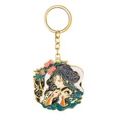 a keychain with an image of a woman holding a flower in her hand