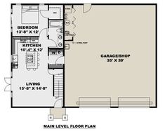 the main level floor plan for a two story house with an attached garage and living room