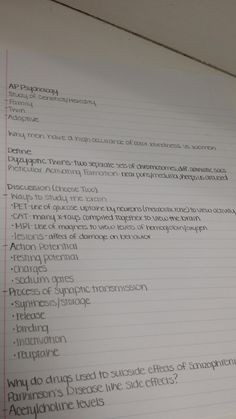 a piece of paper that has some writing on it and is lined in red ink