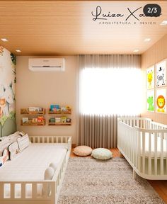 a baby's room with a crib in the corner