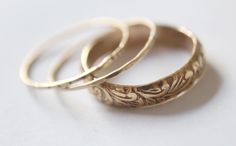 Handmade floral wedding / engagement wide band in 14k gold-filled. Handmade in your customized size. It can be worn alone, or as a part of an engagement / wedding stackable set.  Set of 3  1xfloral pattern 14k gold-filled band 1xlightly hammered 14k gold-filled ring 1xnotched 14k gold-filled ring Available in *925 sterling silver *14k Gold-filled Heirloom Etched Jewelry For Wedding, Heirloom Etched Wedding Jewelry, Bohemian Stackable Wedding Jewelry, Etched Gold Round Bands, 14k Gold Jewelry With Intricate Design For Marriage, Heirloom Etched Wedding Bands, Stackable Wide Band Wedding Jewelry, Vintage Thick Band Wedding Jewelry, Delicate Gold Engraved Rings