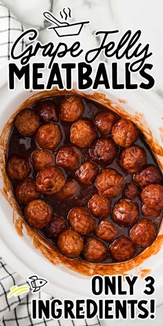 a white plate topped with meatballs covered in gravy on top of a table