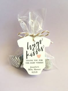 baby shower favors wrapped in cellophane and tied with jumbo's twine