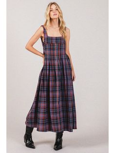 This dress combines classic plaid patterns with modern design elements, making it a versatile addition to any wardrobe. Features : - Square beck - Sleeveless - Smocking back detail - Pockets - Plaid cotton fabric Shop online or in-store in our Savannah, Georgia Boutique! Modern Design Elements, Fabric Shops Online, Square Neck Midi Dress, Square Neck Dress, Loungewear Sets, Plaid Dress, Mode Inspiration, Fabric Shop, Floral Midi Dress