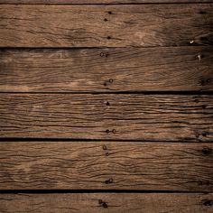 an old wood planks textured with dark brown paint