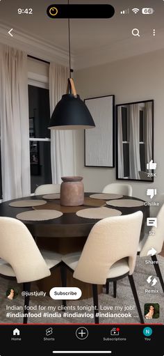 an image of a dining room table with chairs