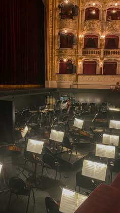 an empty stage with lots of musical instruments