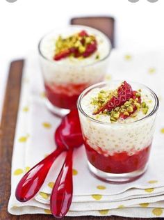 two small desserts with strawberries and granola