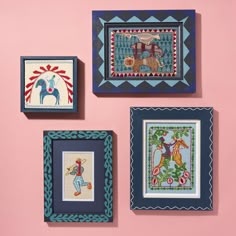 four framed pictures on a pink wall, each with different designs and colors to choose from