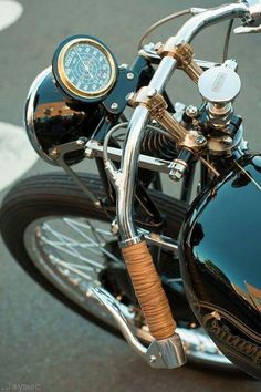 a black and gold motorcycle parked on the street