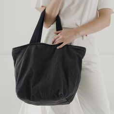 Diso This Baggu Black Washed Denim Canvas Tote Bag!!! It’s An Older Style With A Similar Look To A Mini Cloud Bag That Has An Inner Pocket, Zipper Closure And Thick Straps - Willing To Purchase Or I Have Other Baggu Items Uft Casual Denim Shoulder Bag With Dust Bag, Black Cotton Canvas Bag For On-the-go, Black Denim Travel Bag, Everyday Denim Shoulder Bag, Chic Black Canvas Bag With Dust Bag, Black Denim Travel Shoulder Bag, Chic Black Canvas Bag For On-the-go, Everyday Dark Wash Cotton Shoulder Bag, Versatile Denim Bag