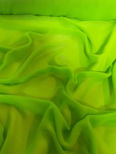 the green fabric is very soft and draped with it's sheerness