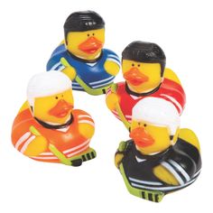 three rubber ducks are wearing life vests