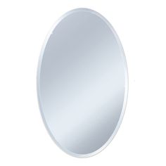 an oval mirror on a white wall