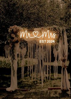 a neon sign that reads mr and mrs