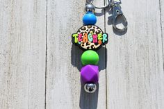 Get this adorable keychain for any teacher in your life! Fun Multicolor Keychains For Gifts, Personalized Fun Keychains, Fun Personalized Keychains, Personalized Playful Keychains For Gifts, Multicolor Fun Keychains For School, Playful Personalized Keychains For Gifts, Fun Multicolor Keychains For School, Multicolor Keychains With Key Clip As Gift, Acrylic Teacher Keychain