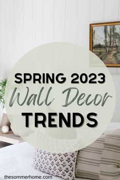 a bedroom with white walls and pillows that says spring 2013 wall decor trend