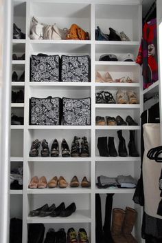 the closet is full of shoes and bags