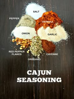 cajun seasoning ingredients on a wooden table with the words cajun seasoning