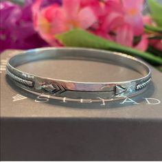 Silpada ‘Arrow Dynamic’ Sterling Silver Etched Bangle Bracelet Item:#B3213 If You Are In To Arrow’s This One Is For You! Fun To Wear! Layer With Other Bracelets! Featured In The 2015 Silpada Catalog Pg 13k Catalog Description “Arrow Dynamic Bangle. Etched Sterling Silver. 2 1/2” In Diameter.” Weights 11 Grams Hallmarked “.925” Sterling Silver Stamp And The Silpada Arrowhead Logo Stamp. Silpada Jewelry Is Of Exceptional Quality, Made With Detailed Craftsmanship, And Designed By Artisans From Arou Southwestern Sterling Silver Polished Bangle Bracelet, Adjustable Silver Southwestern Bangle, Silpada Bracelet Cuff, Nickel-free Southwestern Style Bangle, Silpada Earrings, Silpada Jewelry, Sterling Silver Bangle Bracelets, Sterling Silver Bangles, Logo Stamp