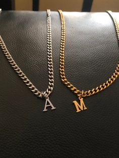 "Men's Gold Letter Pendant Necklace, Silver Cuban Chain Initial Choker, Waterproof, Personalized Gift for Him, Boyfriend, Husband, Dad, Son, Brother, 5mm Stainless Steel tarnish free jewelry for a couple  The personalized initial necklace is made by high quality material with our best care , which is a perfect gift for men. I also have 3mm or 7mm Cuban chain (Letter size will be the same for all sizes of the chains) *Materials: Stainless Steel * Colors: Gold, Silver PVD Coating Technology to mak Men Initial Necklace, Silver Cuban Chain, Gold Letter Pendants, Chain Letter, Pvd Coating, Pendant Necklace Silver, Letter Pendant Necklace, Gold Letter, Dad Son