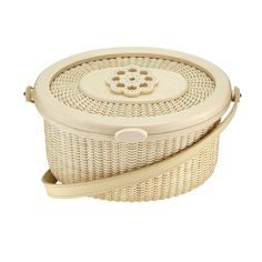 Having summered on Nantucket since she was child, Ashley set out to make summer accessories inspired by her favorite island. The Monomoy basket is a modern and refreshed take on the classic Nantucket basket. This basket is handmade using holly and rattan by American artisans who have mastered the basket weaving craft found in the Northeast and on Nantucket. We've adorned our basket with a faux ivory flower on top and mother of pearl flowers on the sides with an ivory leather handle. *Final Sale Weaving Craft, Pearl Flowers, Ivory Flower, Ivory Flowers, Summer Accessories