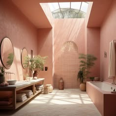 a bathroom with pink walls and tiled flooring next to a bathtub, sink, mirror and potted plants