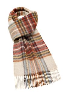 "Otley Rust Scarf Made from 100% Pure Merino Lambswool the finest available species of Lambswool giving a soft and luxurious feel to the product. Seen here is the Otley Rust Scarf Approximate size including fringe 10\" x 75\" (w x l) MADE IN ENGLAND This product is manufactured by Abraham Moon & Sons Ltd who have been producing quality wool products at their mill in Yorkshire, England since 1837. This is one of the last remaining vertical mills in England and it has been operating since the end Teal Scarf, Wool Products, Plain Scarves, Plaid Throw Blanket, Cowl Knitting Pattern, Tartan Scarf, Plaid Throw, Scarf Pattern, Scarf Styles