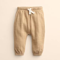 These woven pants from Little Co. By Lauren Conrad are elevated and comfortable to dress your little one. These woven pants from Little Co. By Lauren Conrad are elevated and comfortable to dress your little one. FEATURES Functional drawstring waistband Fully encased elasticFABRIC & CARE 100% organic cotton Machine wash ImportedRESPONSIBLE Organic cotton Global Organic Textile Standard Certified Size: 12 Months. Color: Lt Beige. Gender: male. Age Group: infant. Clothes Guide, Organic Fabrics, Baby Essentials, Baby Products, Bottom Clothes, Lauren Conrad, Drawstring Waistband, 3 Months, Bottoms Pants