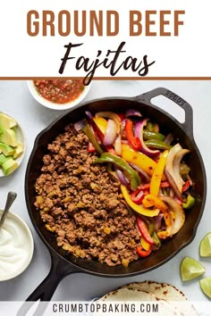 ground beef fajitas with peppers and onions in a skillet