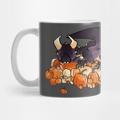 a coffee mug with an image of a dragon and pumpkins