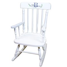 a white wooden rocking chair with the letter b on it's back and seat