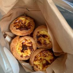 small pastries are in a paper bag