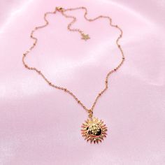 "This listing is for a resizable 18k gold plated sun charm necklace with gold plated stainless steel chain. Necklace is 16.5\" with a 2.5\" extension, max length is 19\". Great for layering!" Adjustable Gold Plated Charm Necklaces, 14k Gold Necklaces With Sun Design, Tarnish Resistant 14k Gold Filled Gold-tone Charm Necklaces, Adjustable Metal Necklace With Sun Design, Gold Dainty Sun Design Charm Necklace, Dainty Gold Charm Necklace With Sun Design, Gold Sun-shaped Jewelry For Everyday, Yellow Gold Brass Jewelry With Sun Design, Tarnish Resistant Yellow Gold Charm Necklace In Stainless Steel