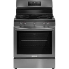 an oven with the door open and its lights on, in front of a white background