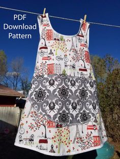 a dress hanging on a clothes line with the words pdf download pattern below it