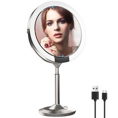 a woman's face is shown in the mirror and plugged into a charger