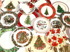 many plates with christmas decorations on them