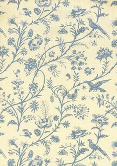 a blue and white wallpaper with birds on it