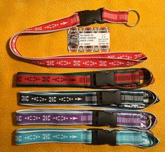 The Sis'łichíí or sash belt is worn as part of traditional Navajo dress. Sash belts are also important to neighboring Pueblo tribes.  This lanyard features a traditional woven design and is a modern way to honor the tradition in everyday life. 1 inch wide and about 18 inches long. Keychain is detachable. Machine woven on a jacquard loom out of polyester thread. Navajo Sash Belt Designs, Navajo Sash Belt, Gingerbread Pillow, Navajo Dress, Long Keychain, Navajo Belt, Jacquard Loom, Dress Sash, Handmade Jewelry Tutorials