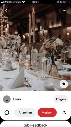 an image of a table setting with candles and flowers on the table for dinner party